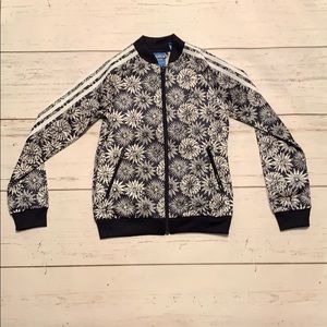 blue adidas jacket with flowers